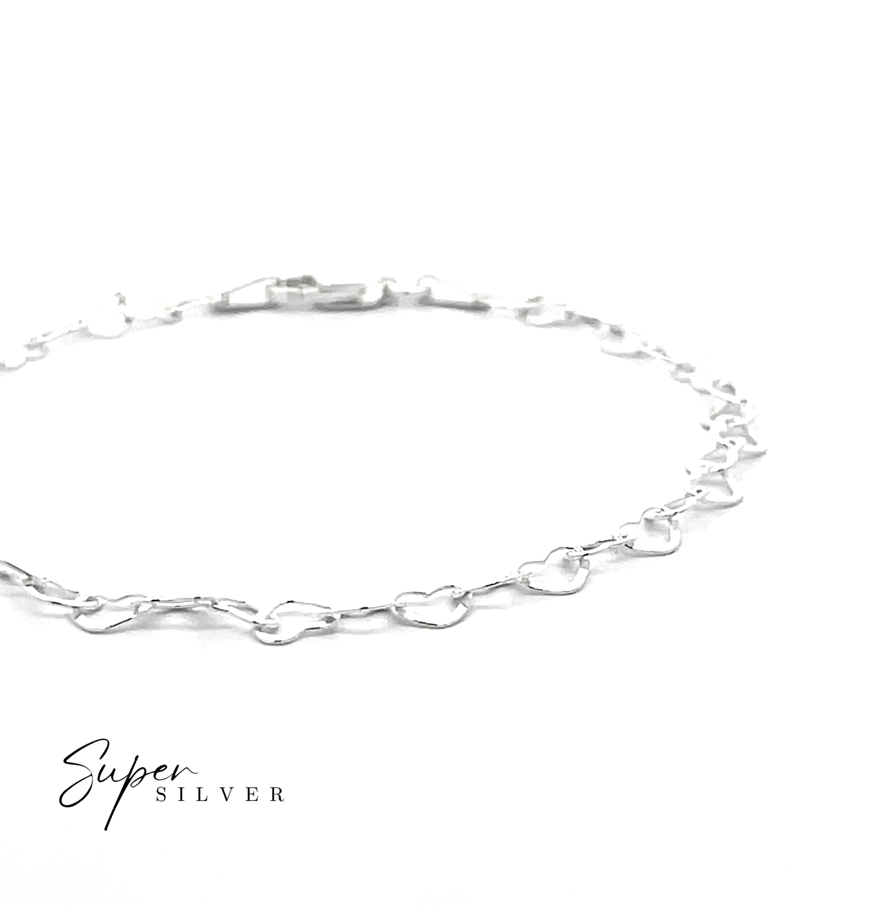 The Italian Heart Link Chain, a delicate sterling silver bracelet, is displayed on a white background with "Super Silver" shown in the lower left corner.