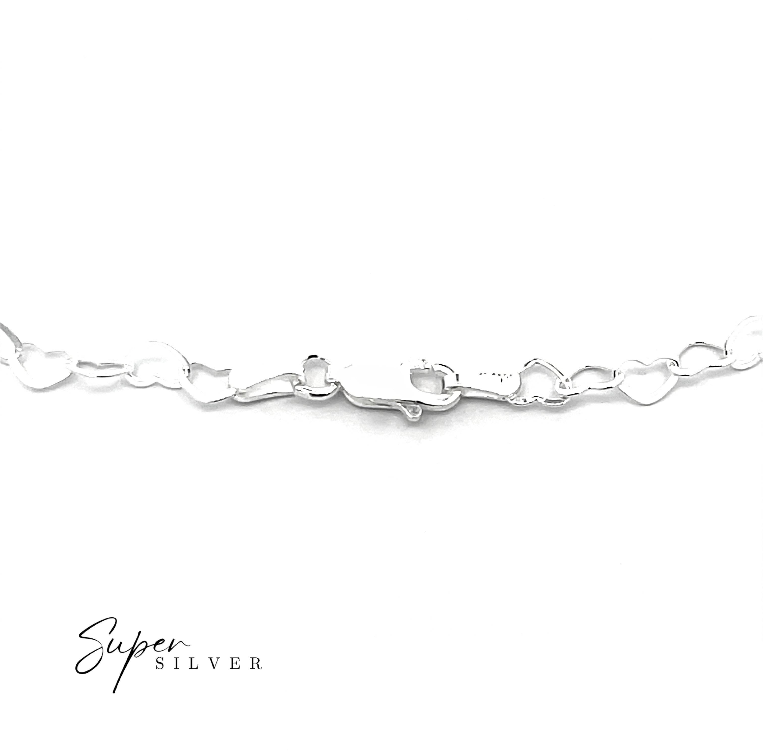 A close-up of the Italian Heart Link Chain, a handcrafted necklace with a silver Italian sterling silver chain and lobster clasp, displayed on a white background. "Super Silver" appears in the bottom left corner.