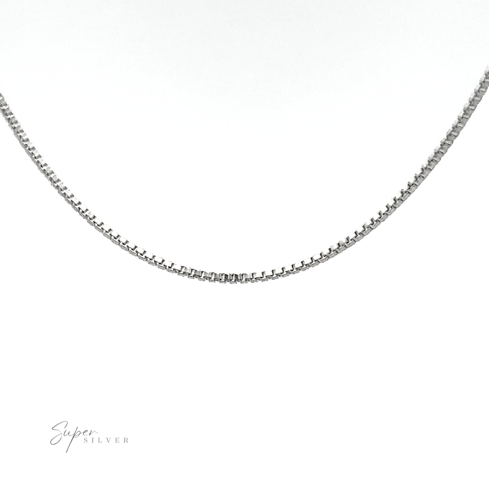 
                  
                    A close-up image of a thin Delicate Sterling Silver Box Chain necklace on a white background. The logo "Super Silver" is visible in the bottom left corner, showcasing the .925 Sterling Silver quality.
                  
                