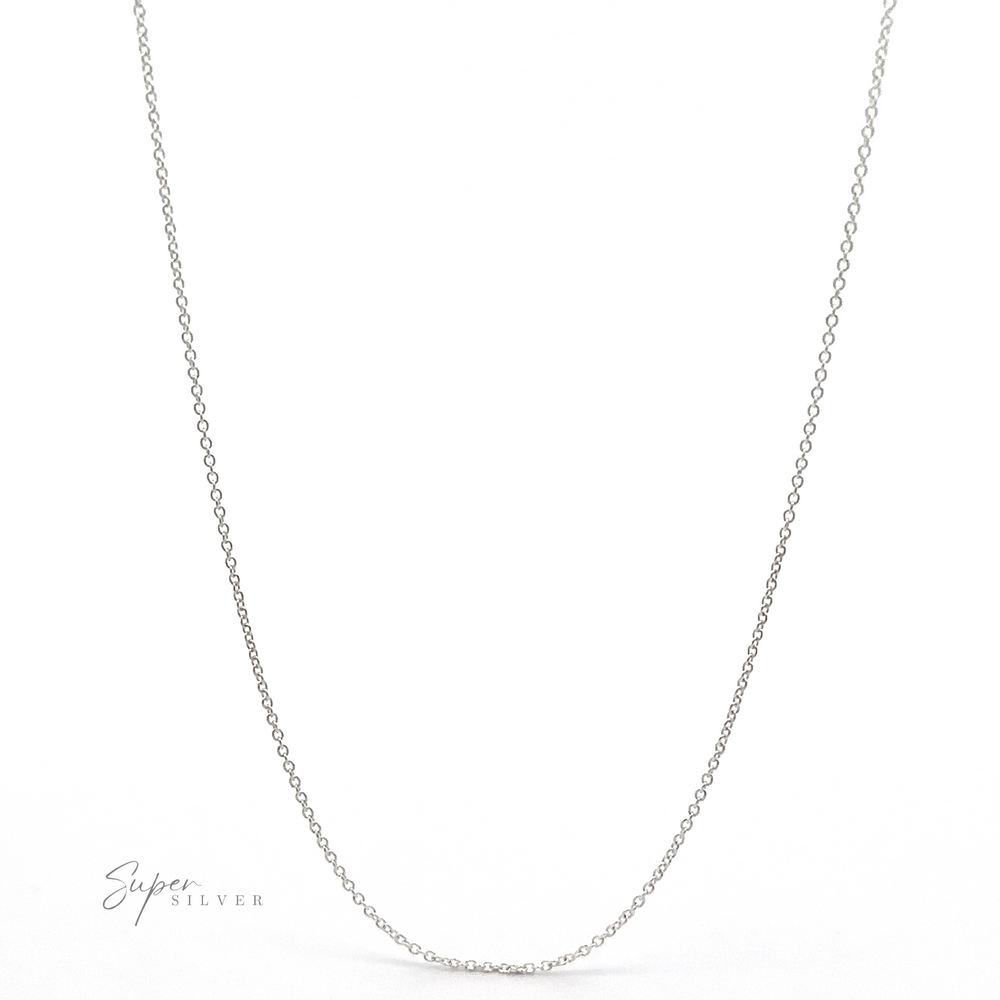 A delicate Dainty Cable Chain necklace made of .925 Sterling Silver featuring small, evenly spaced oval links on a simple white background, with the text "Super Silver" displayed in the lower left corner.