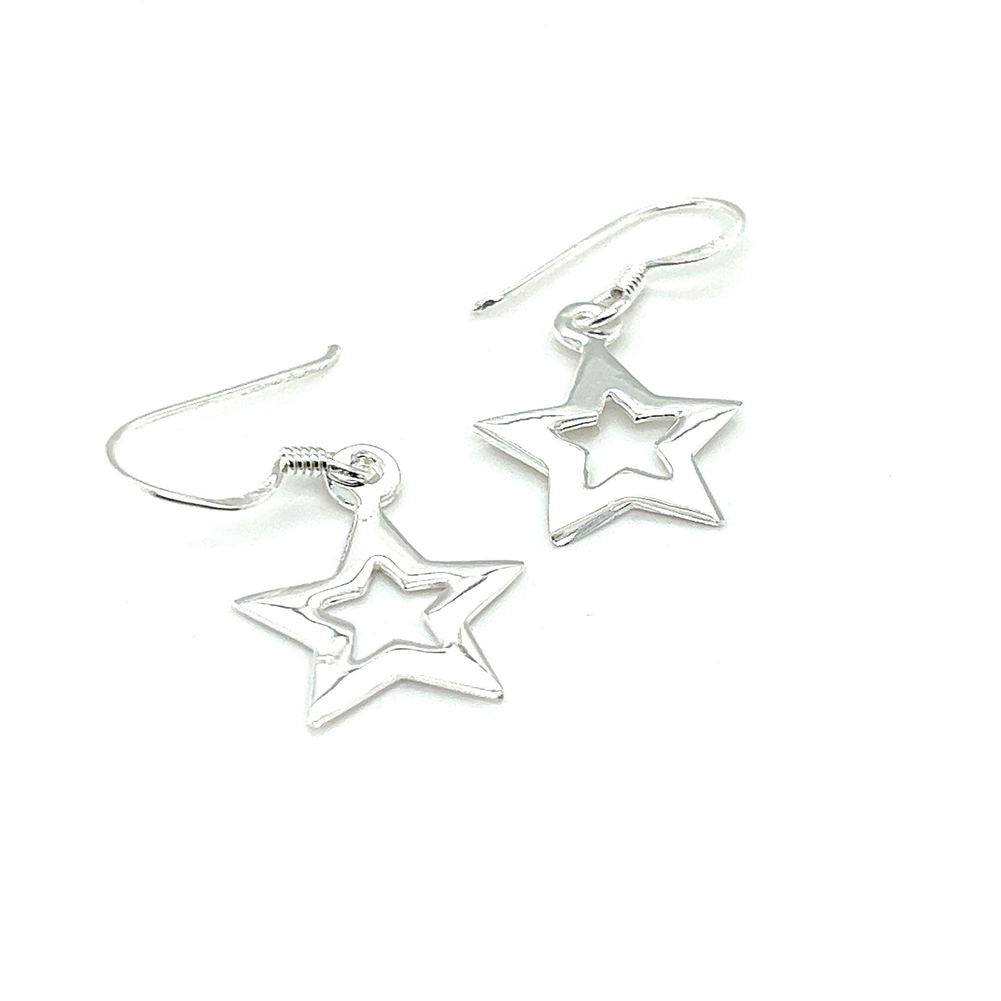Open Super Silver Star Earrings with celestial splendor on a white background.