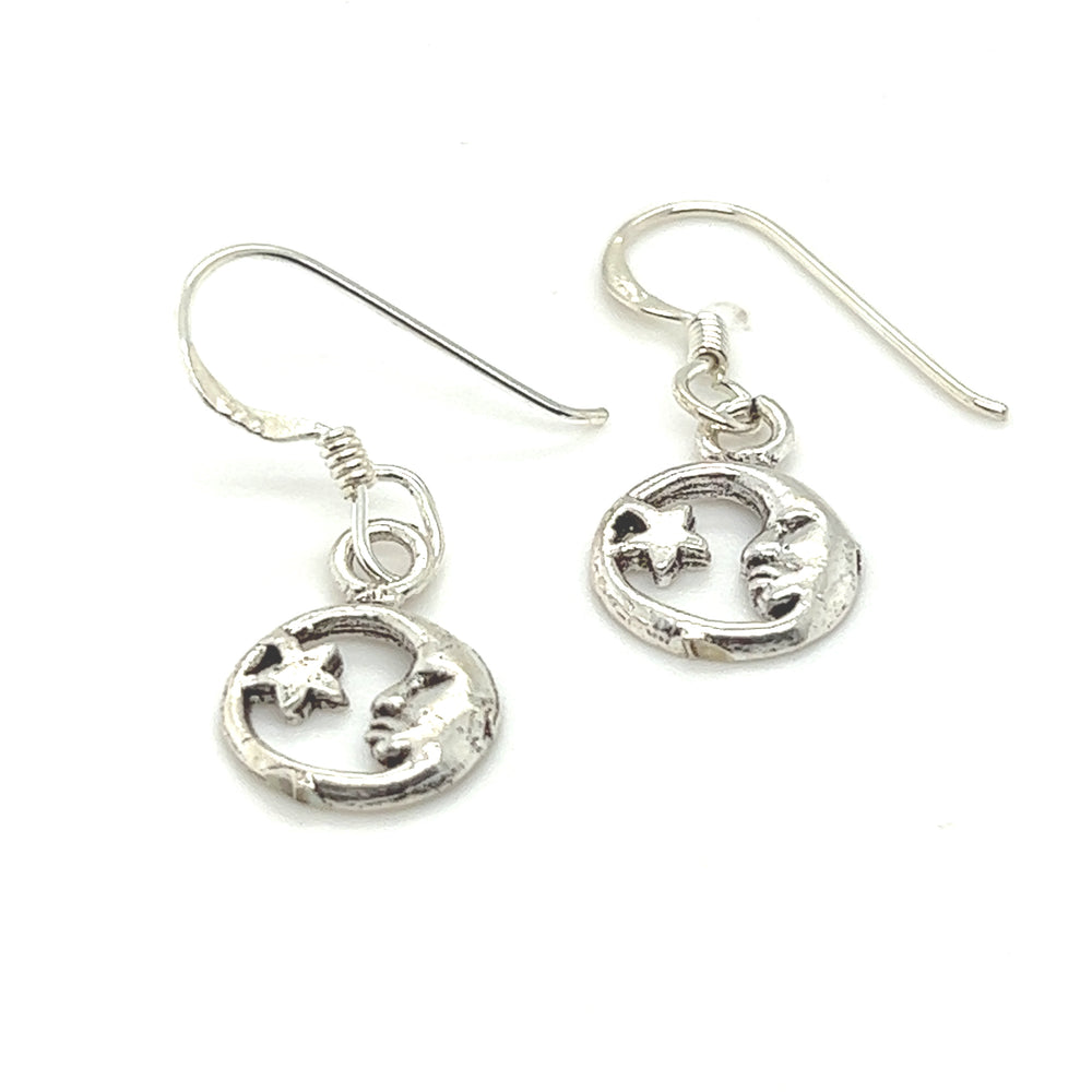 Super Silver presents the Dainty Crescent Moon and Star Earrings with a moon and star design.