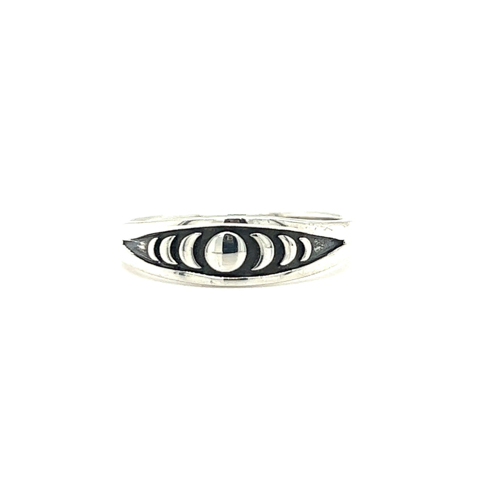 A Tapered Moon Phases Band with a black and white eye design, inspired by the lunar cycle, made by Super Silver.