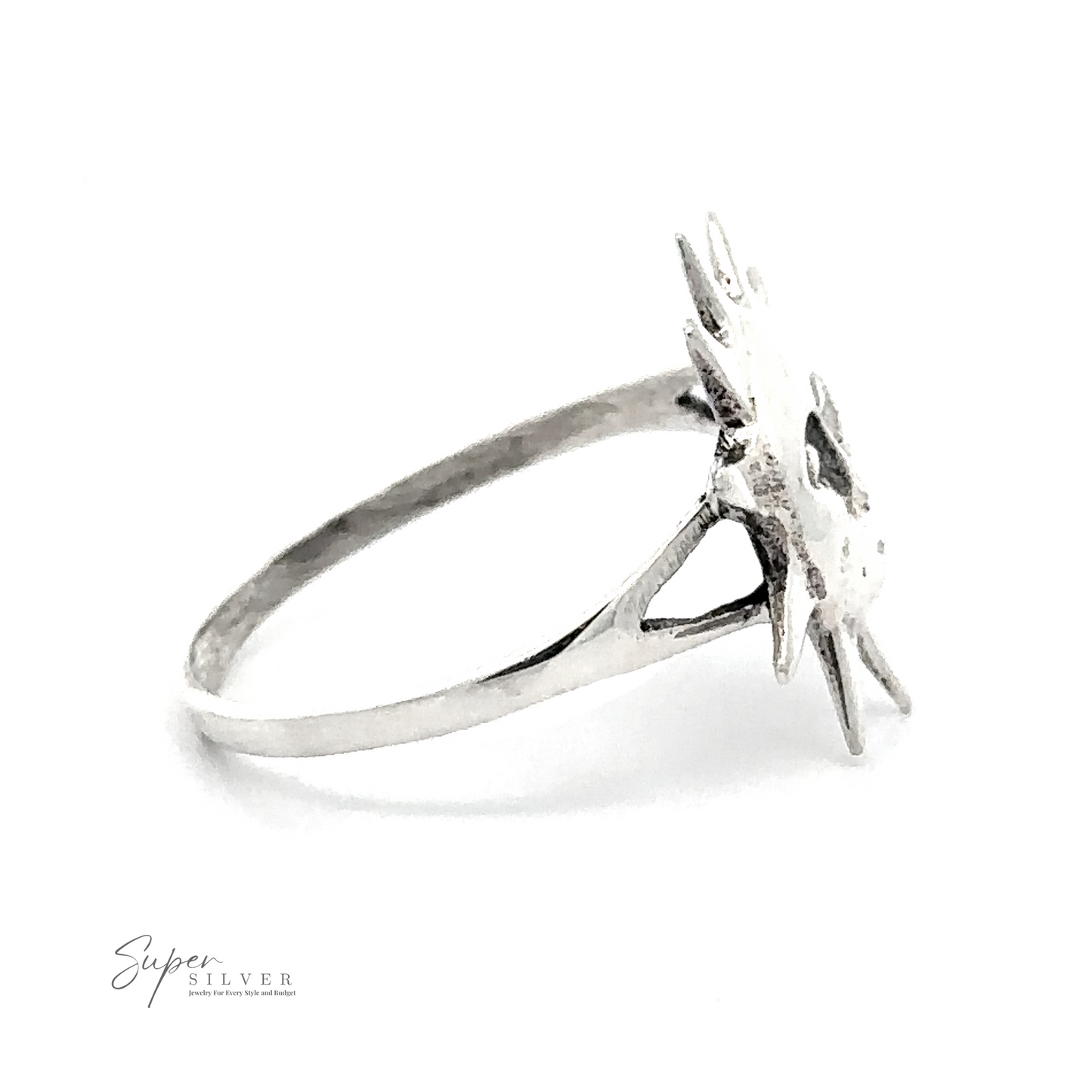 
                  
                    The Silver Sun Ring, crafted from sterling silver and showcasing a striking sun-shaped design with prominent rays, is displayed against a plain white background. The "Super Silver" logo is visible in the bottom left corner, epitomizing exquisite sun-inspired jewelry craftsmanship.
                  
                