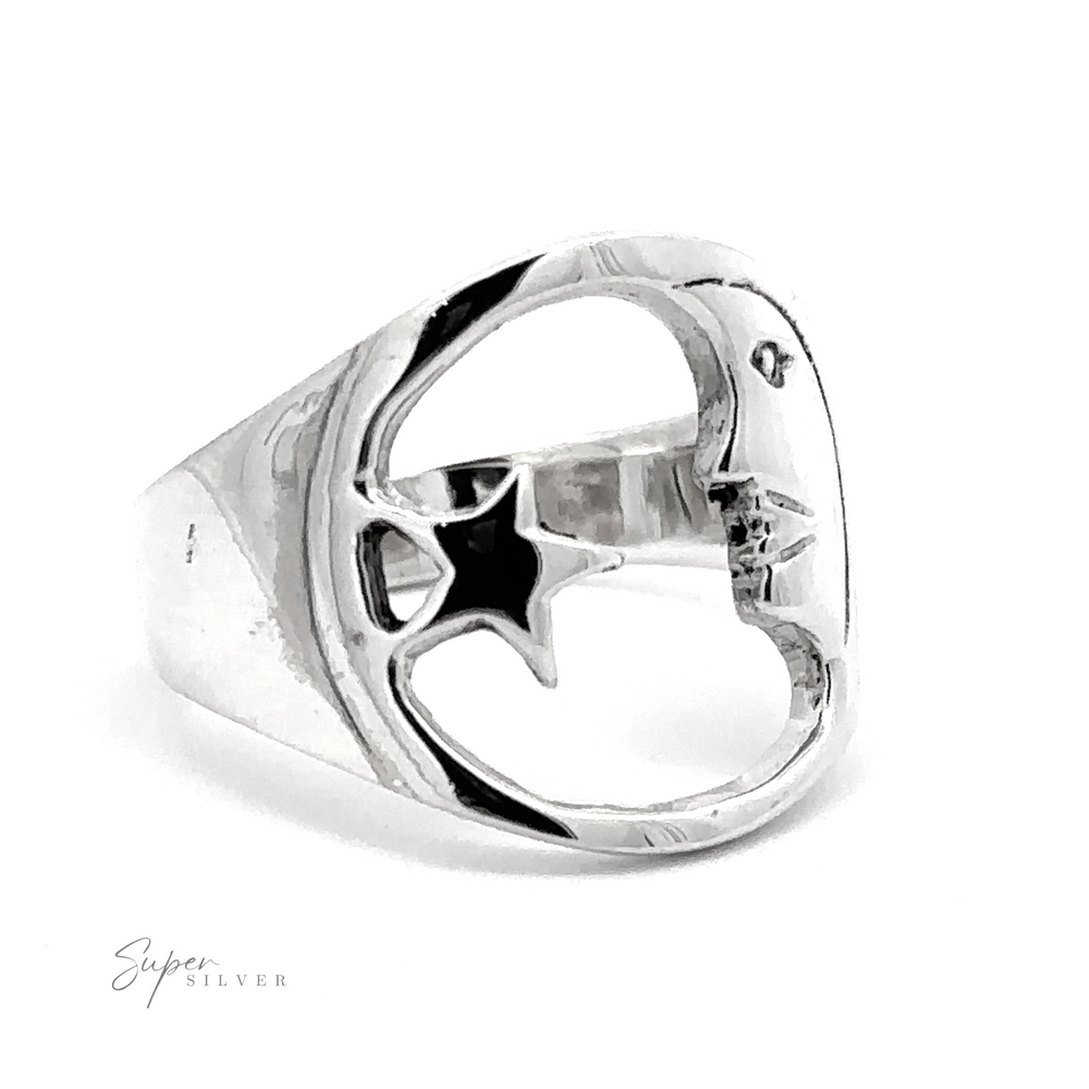 
                  
                    Celestial Moon And Star Ring with a cut-out star design on a white background.
                  
                