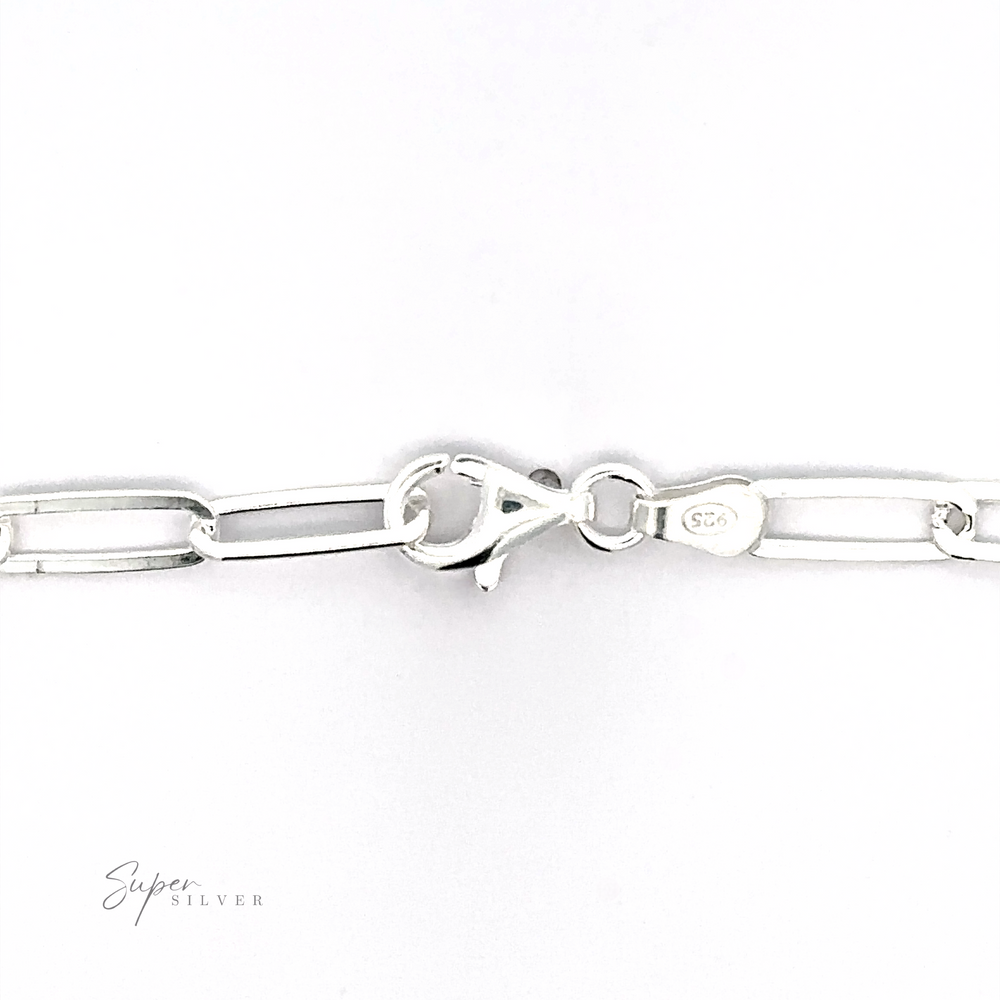 
                  
                    A close-up image showcases the Sterling Silver Paperclip Chain bracelet with a lobster clasp. The minimalistic design features a small "925" engraving, confirming its sterling silver material. The brand name "Super Silver" is on the lower left, highlighting Italian craftsmanship.
                  
                