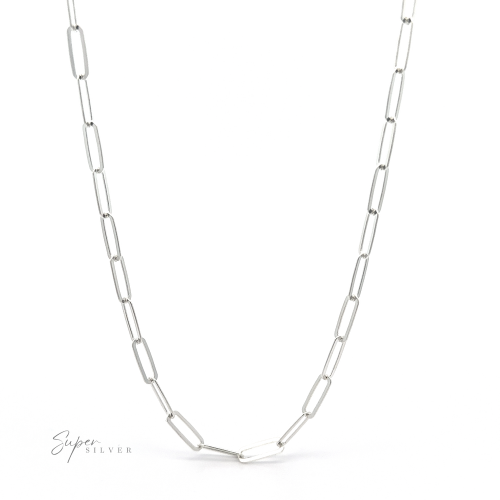 The Sterling Silver Paperclip Chain, characterized by its elongated rectangular links and exemplifying Italian craftsmanship with a minimalist design, is displayed on a plain white background.