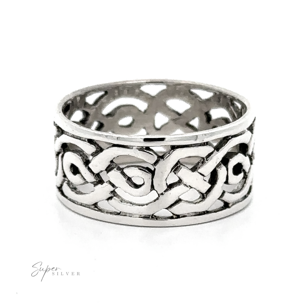 Wide Celtic Knot Band ring in sterling silver. This exquisite Wide Celtic Knot Band ring features a wide Celtic knot band with a cut out design, adding an elegant touch to any jewelry collection.