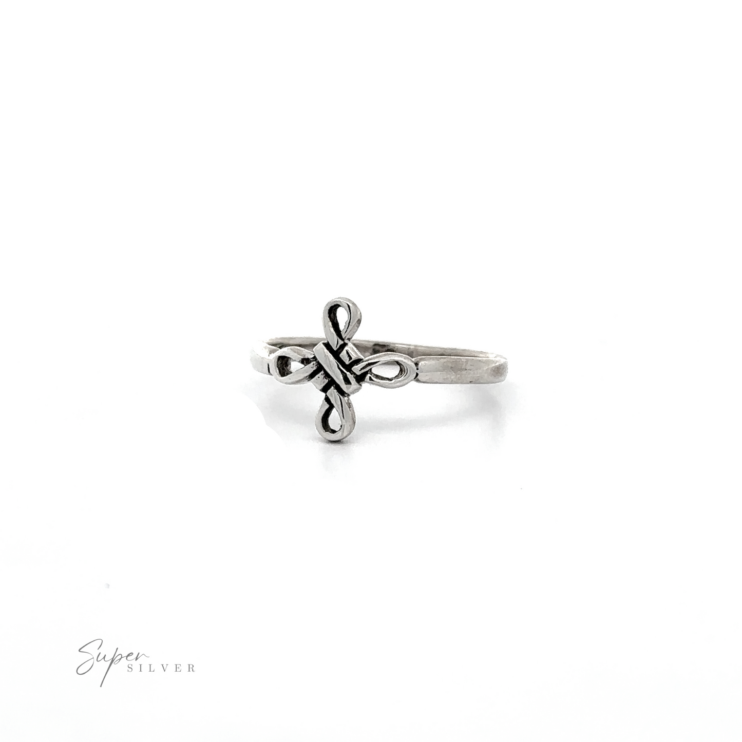 A sterling silver Simple Celtic Four Knot ring with a cross on it.