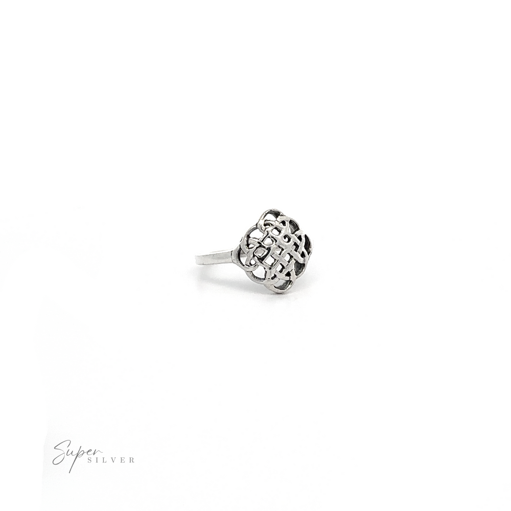 
                  
                    A Beautiful Silver Celtic Knot Ring with a flower on it.
                  
                
