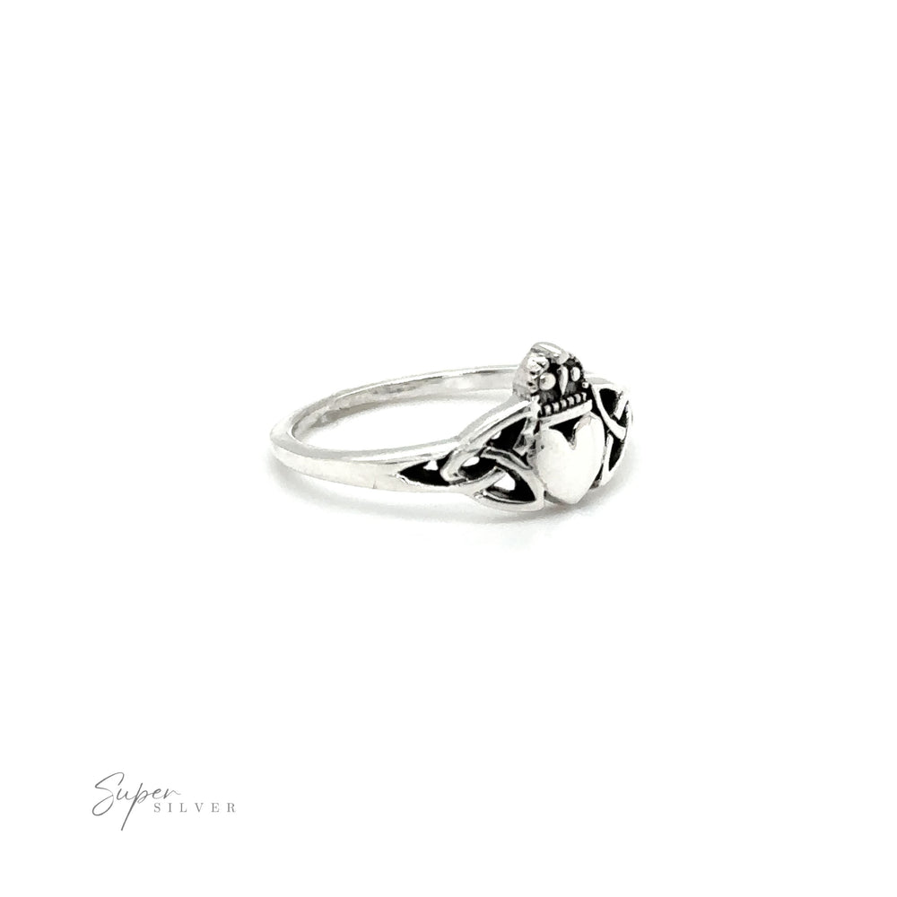 
                  
                    A Celtic Knot Claddagh Ring with a heart on it, representing Irish culture.
                  
                