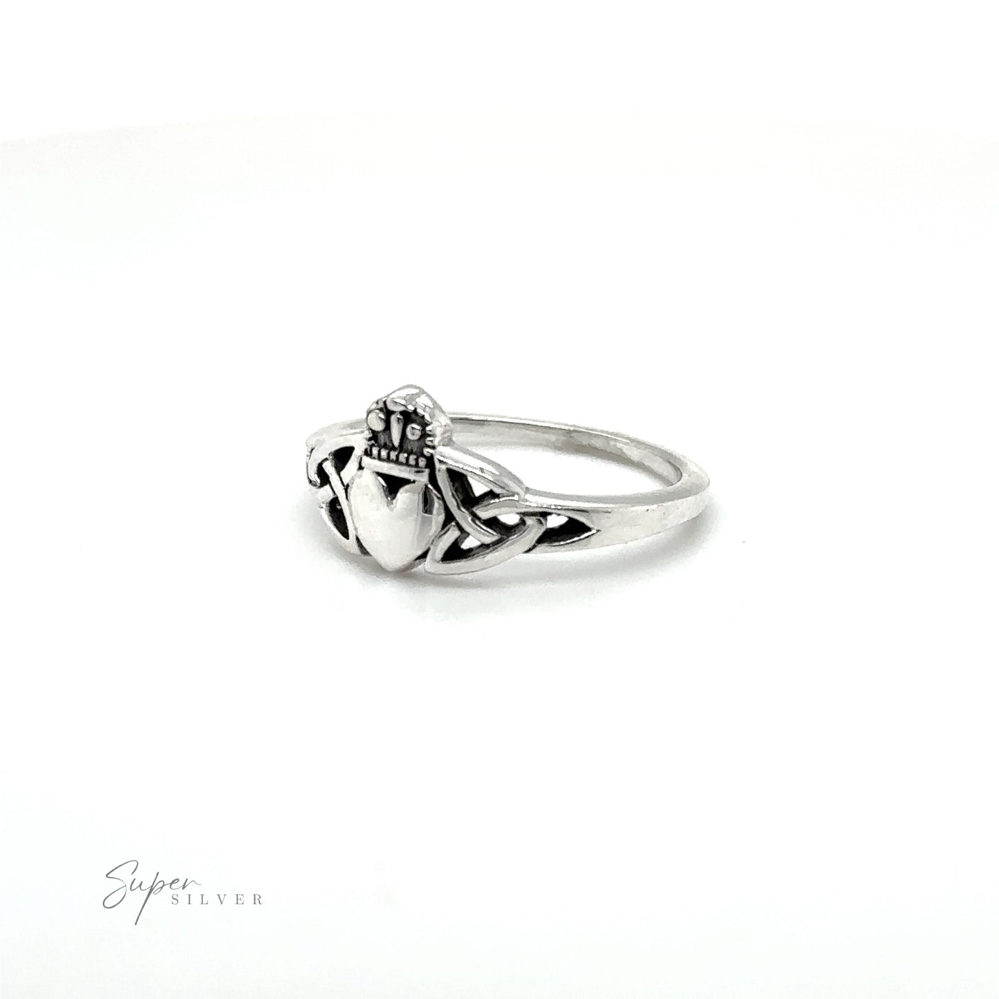An .925 sterling silver Celtic Knot Claddagh Ring with a heart on it, inspired by Irish culture.
