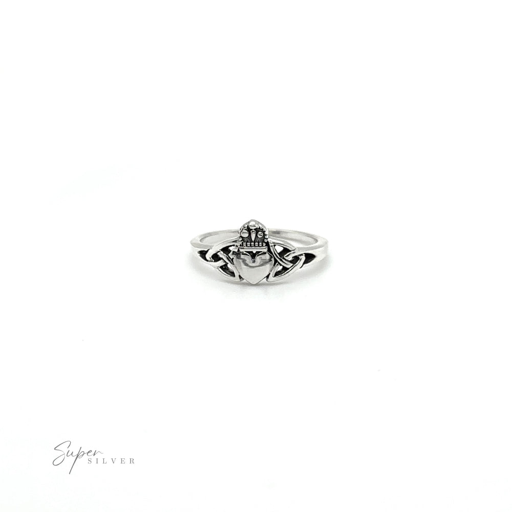 
                  
                    An intricately designed Celtic Knot Claddagh Ring made of .925 Sterling Silver, representing Irish culture, on a clean white background.
                  
                