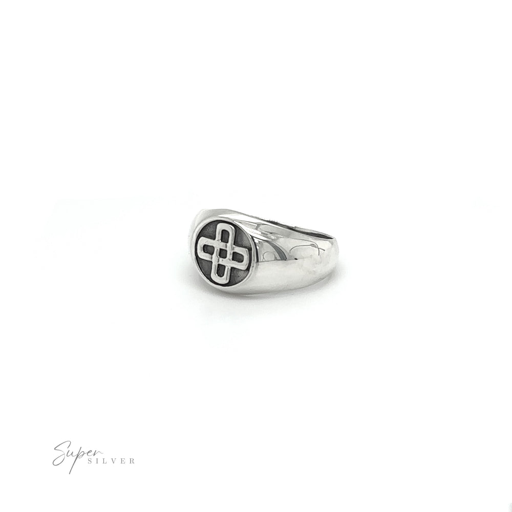 
                  
                    A bold and striking silver Celtic Solomon's Knot Signet Ring with an enigmatic cross engraving, reminiscent of the Solomon's Knot.
                  
                