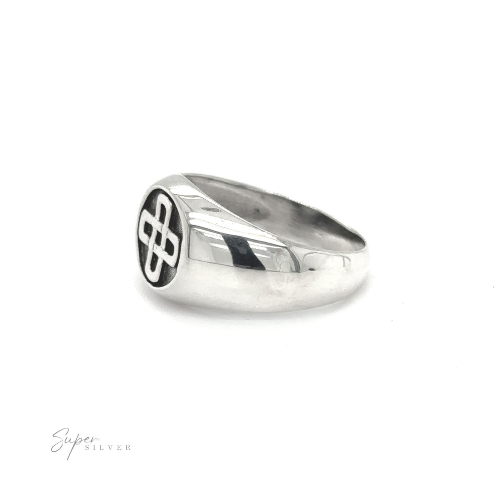 
                  
                    A bold and striking Celtic Solomon's Knot Signet Ring with a cross on it.
                  
                