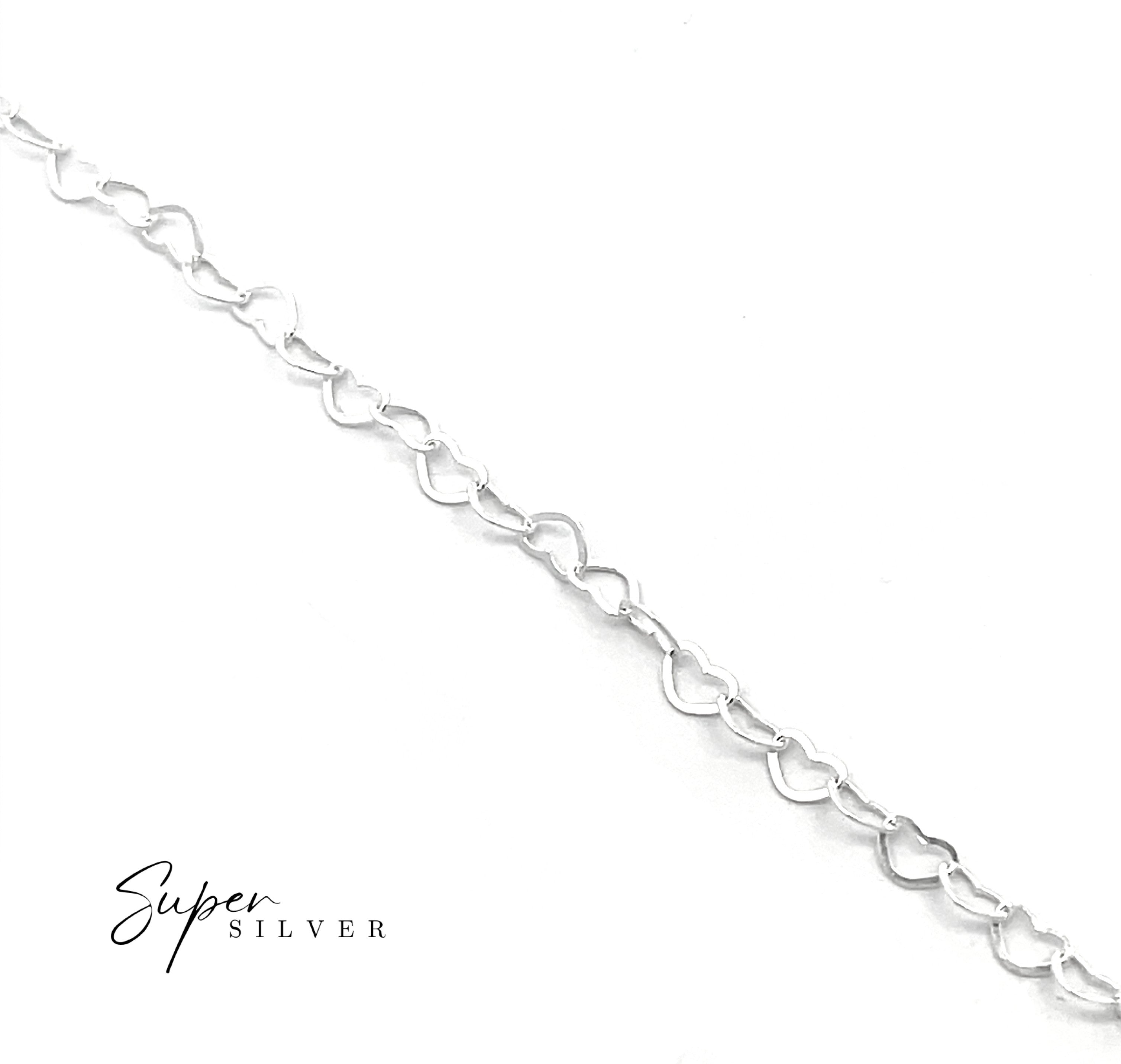 The Italian Heart Link Chain features repeating heart-shaped sterling silver links and is shown diagonally on a white background with the "Super Silver" logo in the bottom left corner.