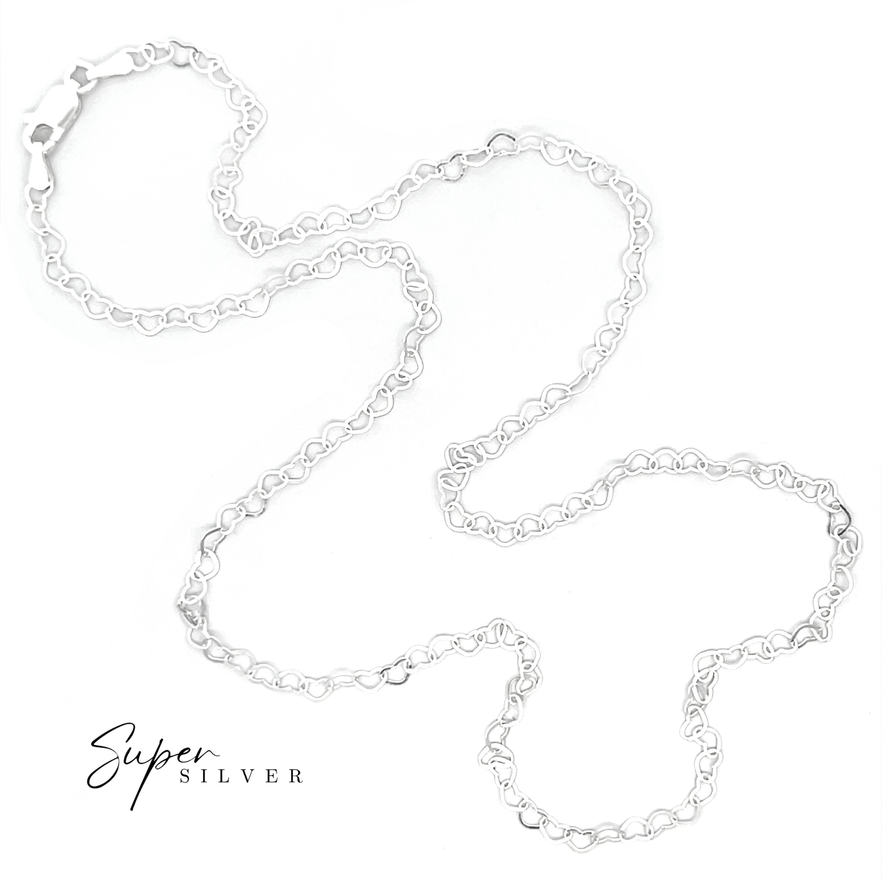 The Italian Heart Link Chain, a delicate sterling silver necklace, is displayed against a white background with "Super Silver" in the lower left corner.