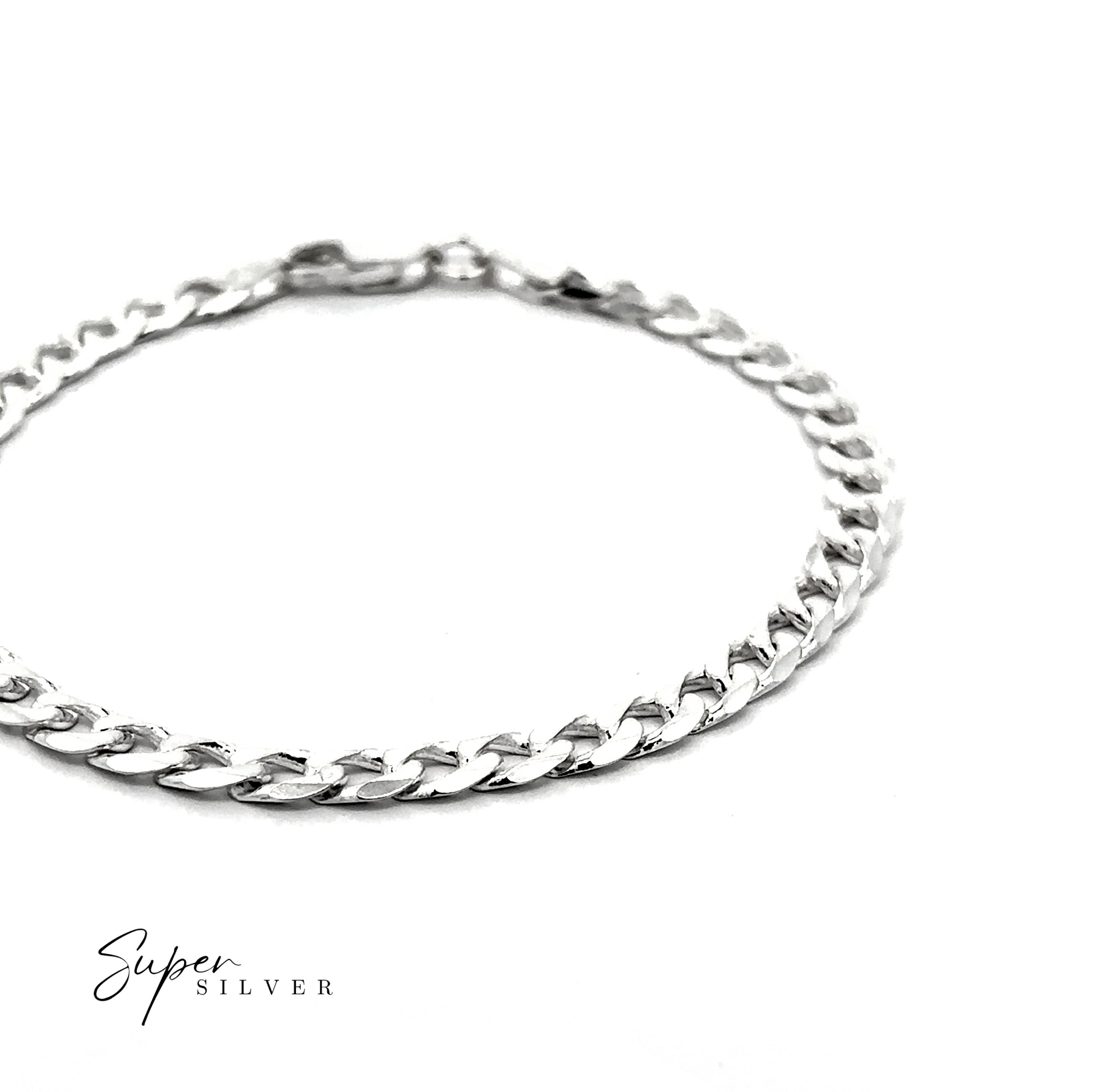 The Signature Italian Curb Chain, a silver bracelet with a simple clasp, is shown on a white background. "Super Silver" appears in the lower left corner.