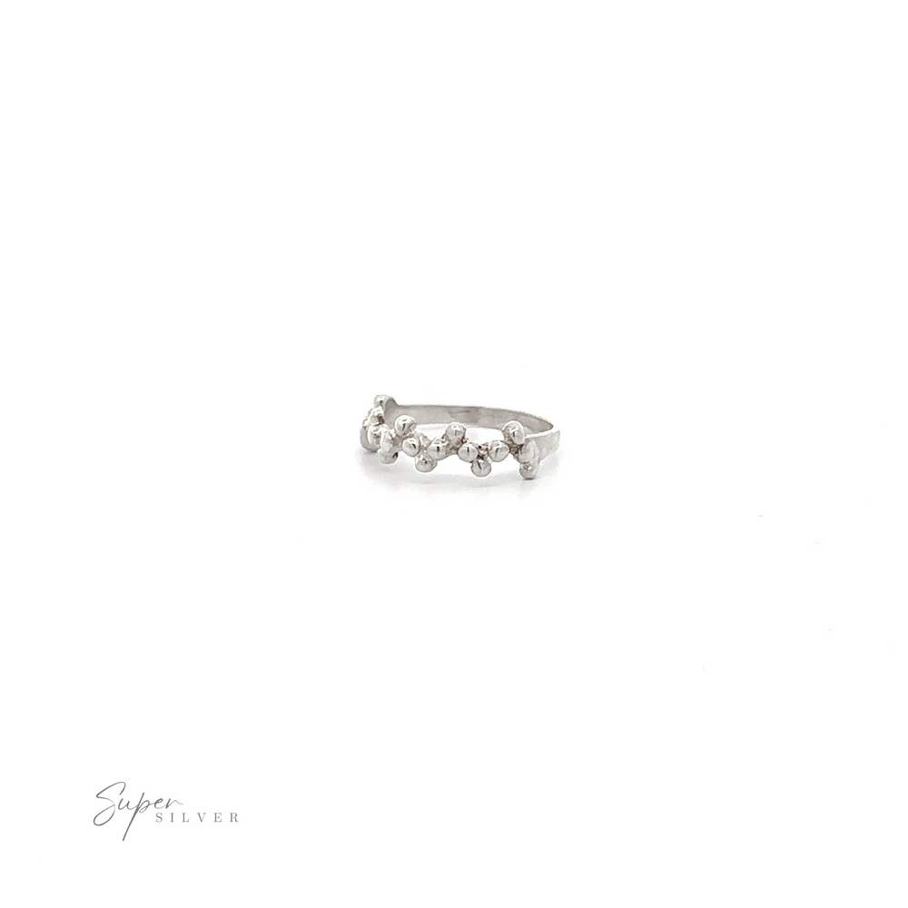 
                  
                    A delicate Beaded Half Zig-Zag Ring with a minimalist design and diamonds, showcasing a polished finish.
                  
                