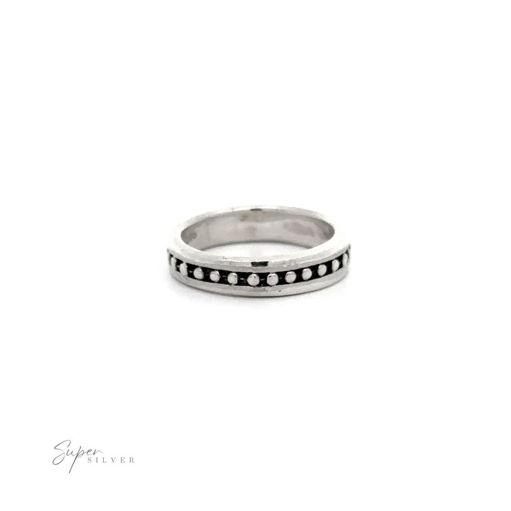 A Silver Band with Ball Pattern on a white background that is sure to look stylish and receive compliments.
