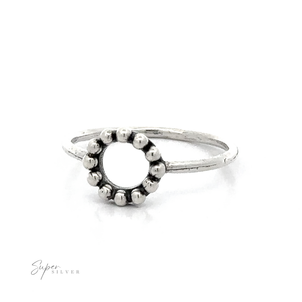 A Silver Ring With Circle And Beads adorns this sterling silver ring, finished with an oxidized touch.