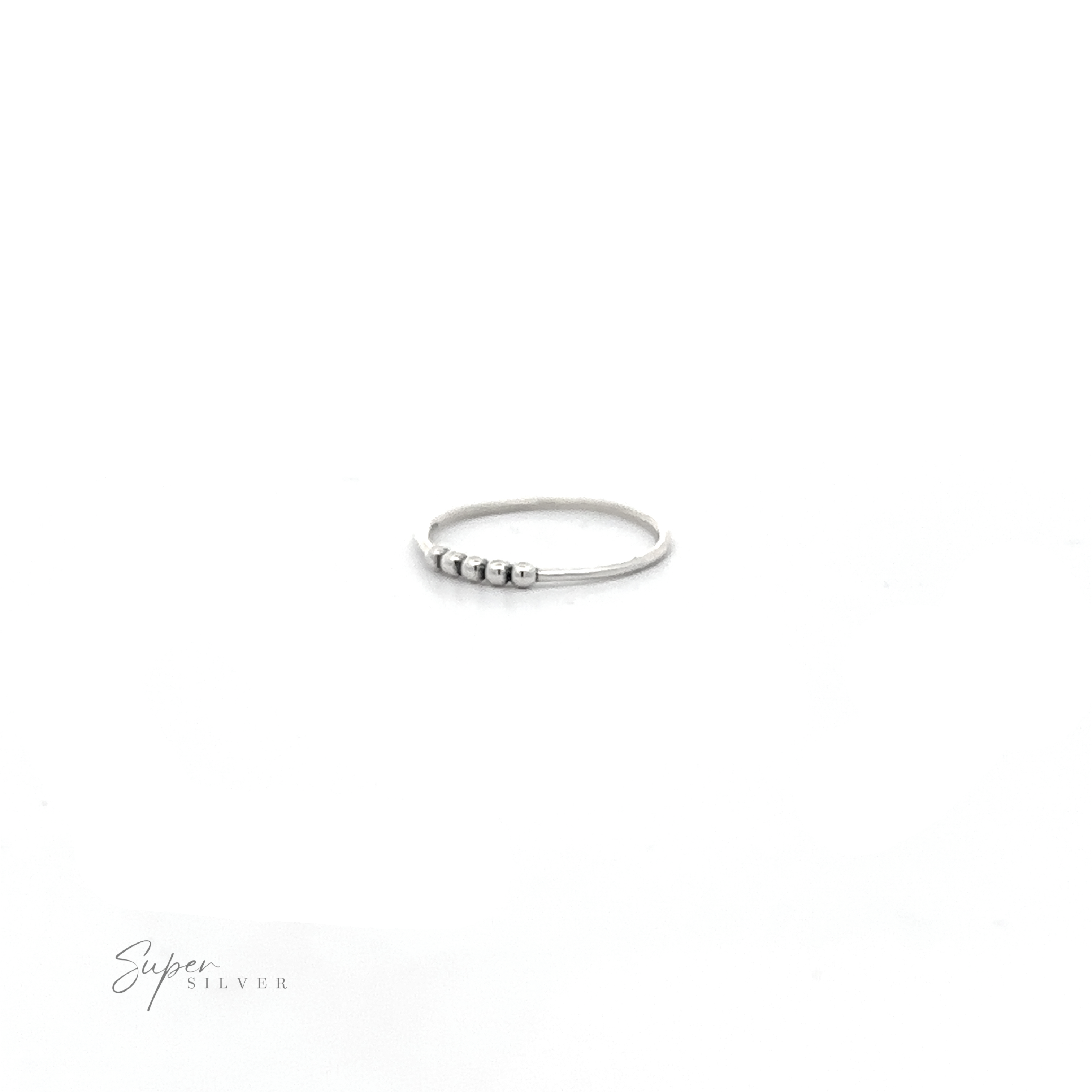 A silver ring with black stones and an oxidized finish called "Silver Ring With Beads" on a white background.