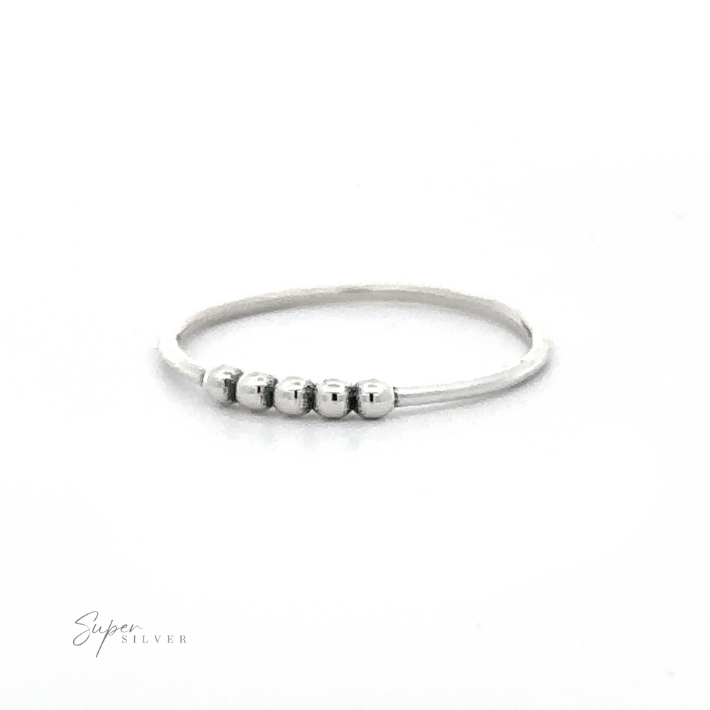 Silver Ring With Beads with an oxidized finish.
