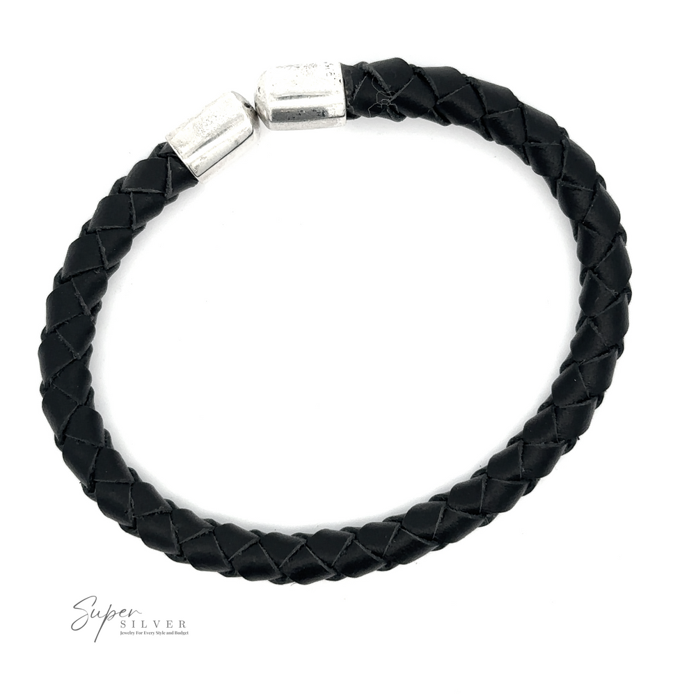 
                  
                    A black Braided Leather Bracelet with a sterling silver magnetic clasp, displayed on a white background. This refined men's accessory proudly features the logo "Super Silver" in the bottom left corner.
                  
                