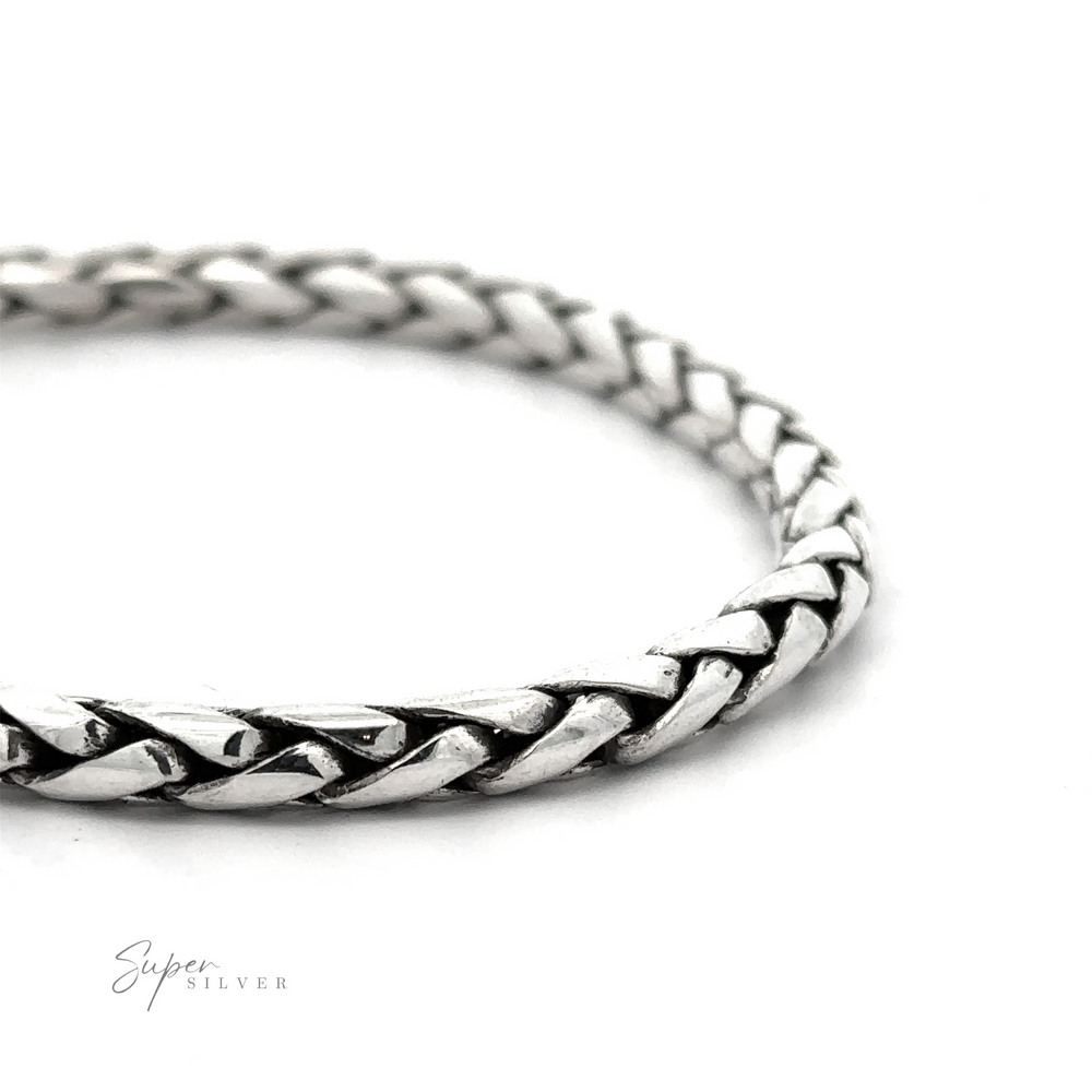 
                  
                    Close-up of a sterling silver woven rope bracelet, 7 inch length, against a white background, labeled "4mm Bright Rope Bracelet" in the bottom left corner.
                  
                