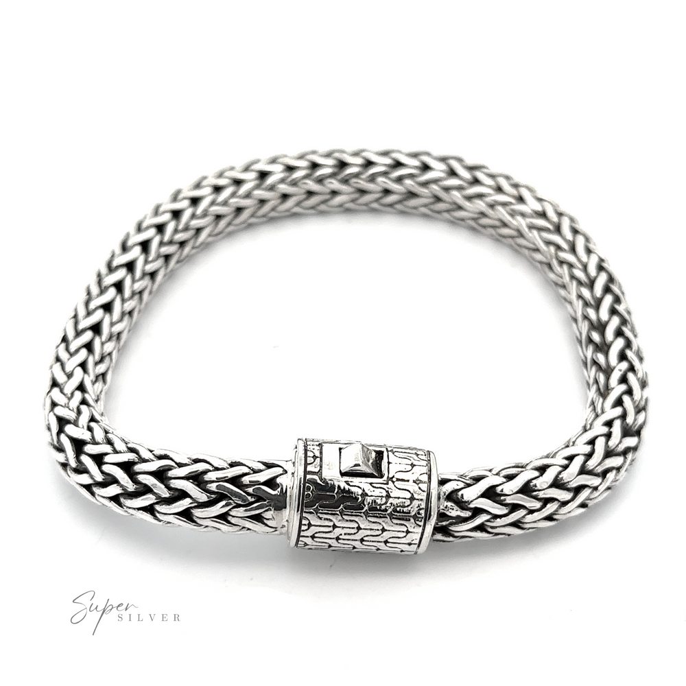 
                  
                    A Heavy Braided Bracelet featuring a textured rectangular clasp with a small square accent, displayed on a plain white background. Crafted from .925 Sterling Silver, the clasp adds a touch of elegance. The text "Super Silver" appears in the lower left corner.
                  
                