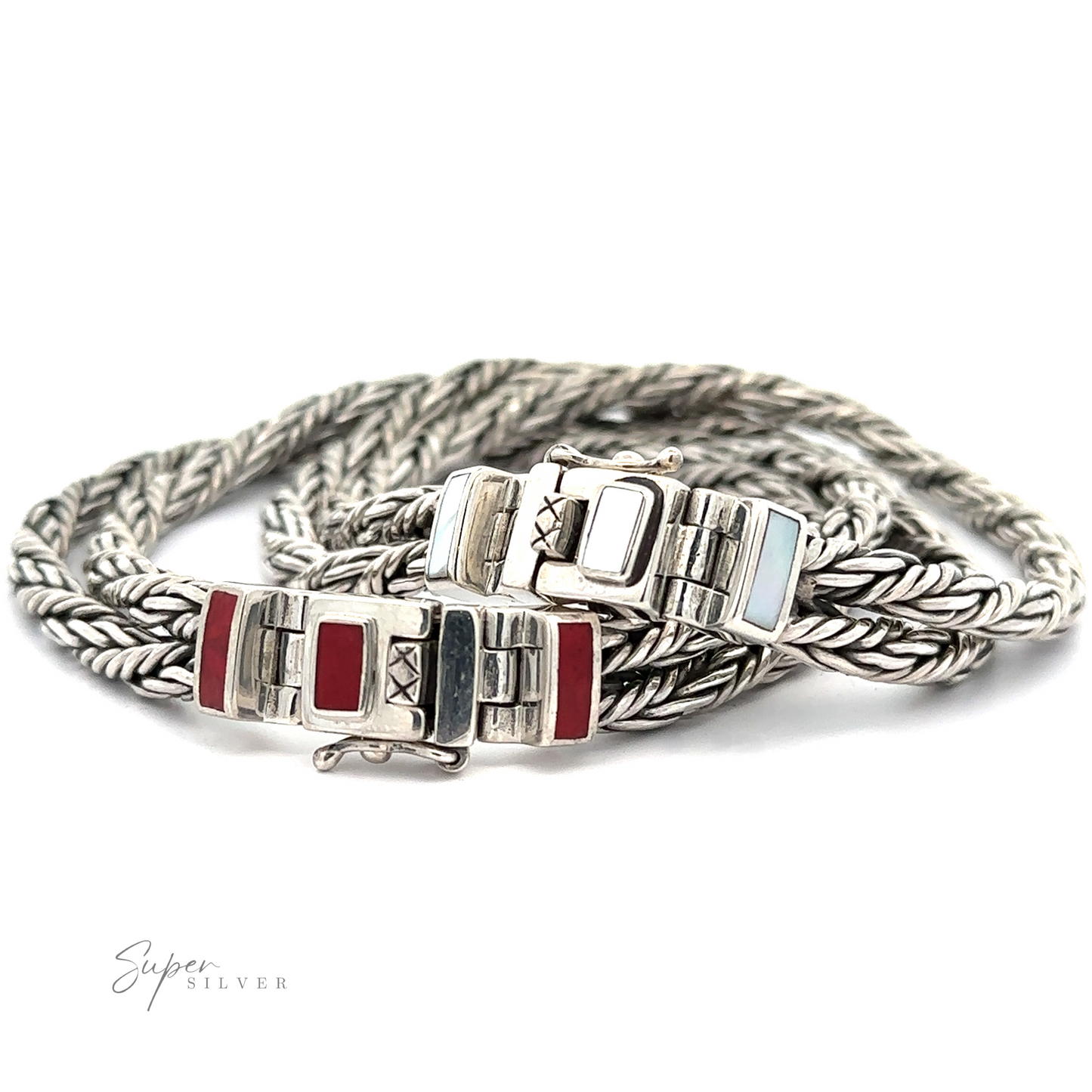 A Double Twisted Braided Rope Bracelet with an intricate double braided design and a clasp decorated with red coral and light blue enamel accents.