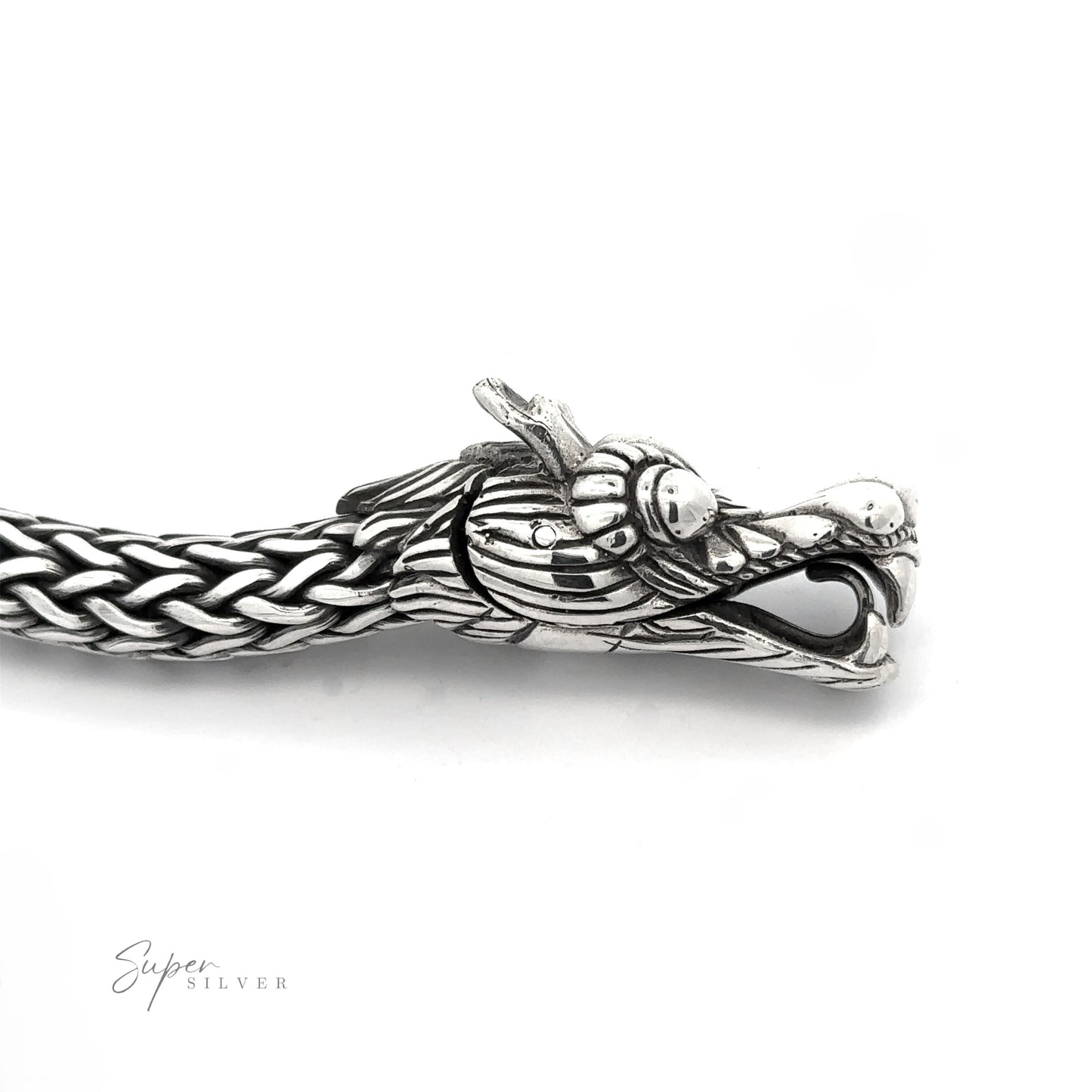 
                  
                    A detailed Sterling Silver Braided Rope Bracelet with Dragon Head featuring an intricately designed, heavy-duty dragon head on one end. The bracelet has a thick braided rope pattern and a polished finish.
                  
                