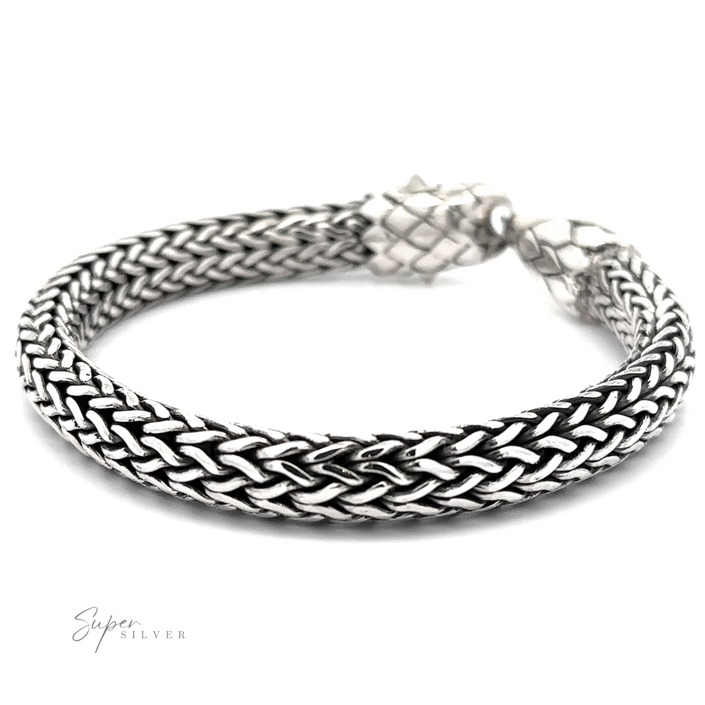 
                  
                    A Heavy Braided Bracelet with Eagle Clasp with a detailed eagle head clasp and a textured design is displayed on a plain background. The brand name "Super Silver" is present in the corner, showcasing the .925 Sterling Silver craftsmanship.
                  
                