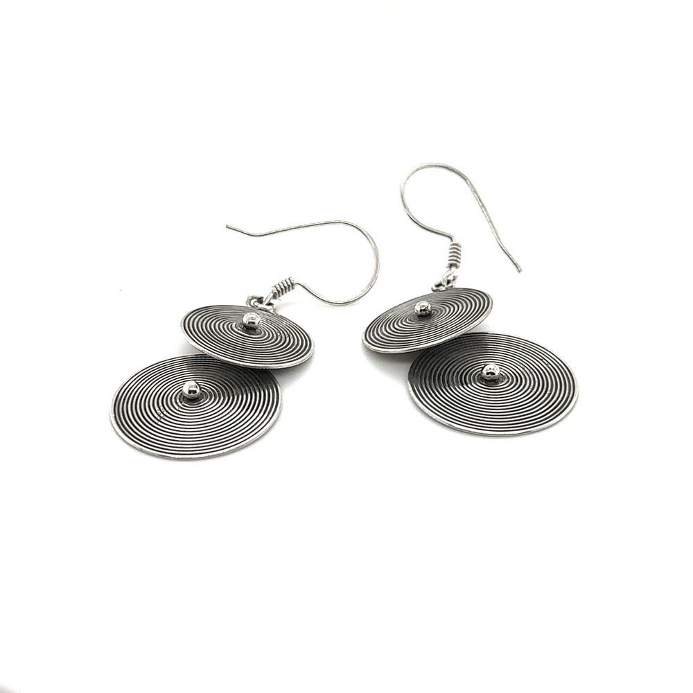A pair of Super Silver Bali Earrings with Two Spiral Disks crafted with .925 silver, displayed on a white background.