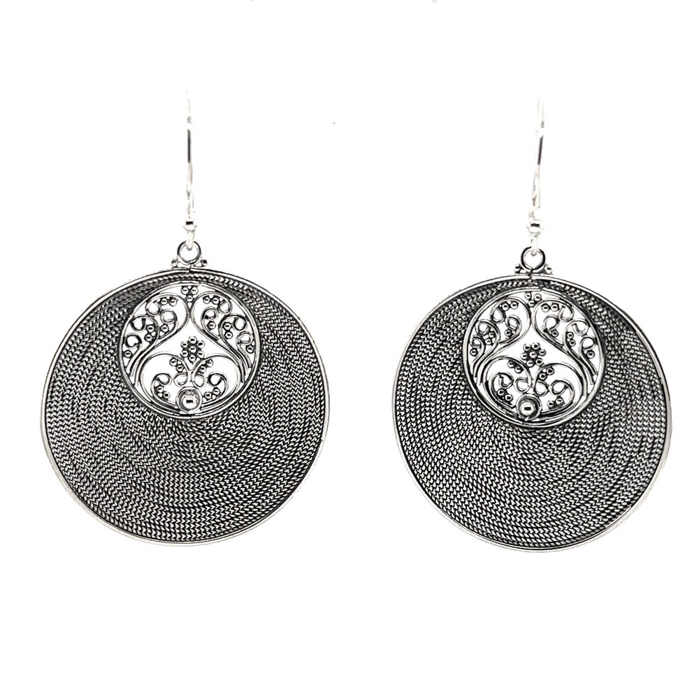 Handmade Super Silver earrings with an ornate Statement Intricate Round Bali design.