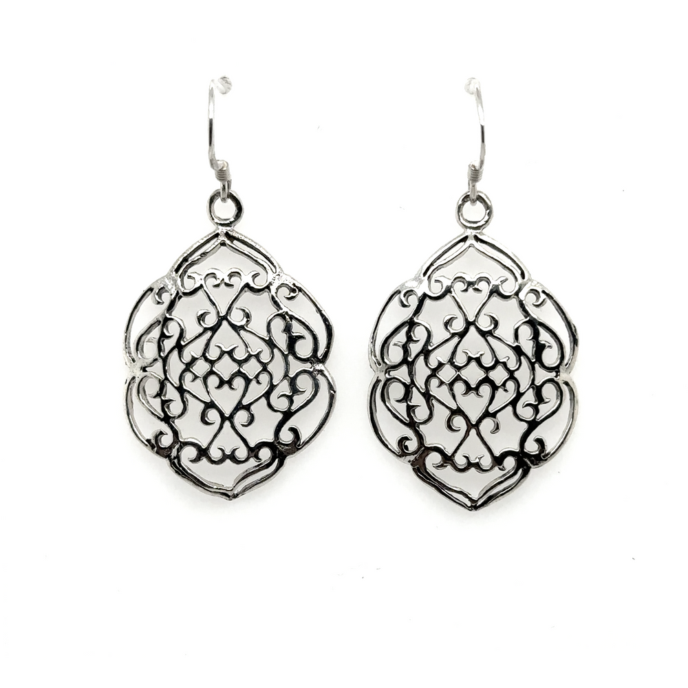 
                  
                    A pair of Super Silver Shield Earrings With Swirl Design.
                  
                