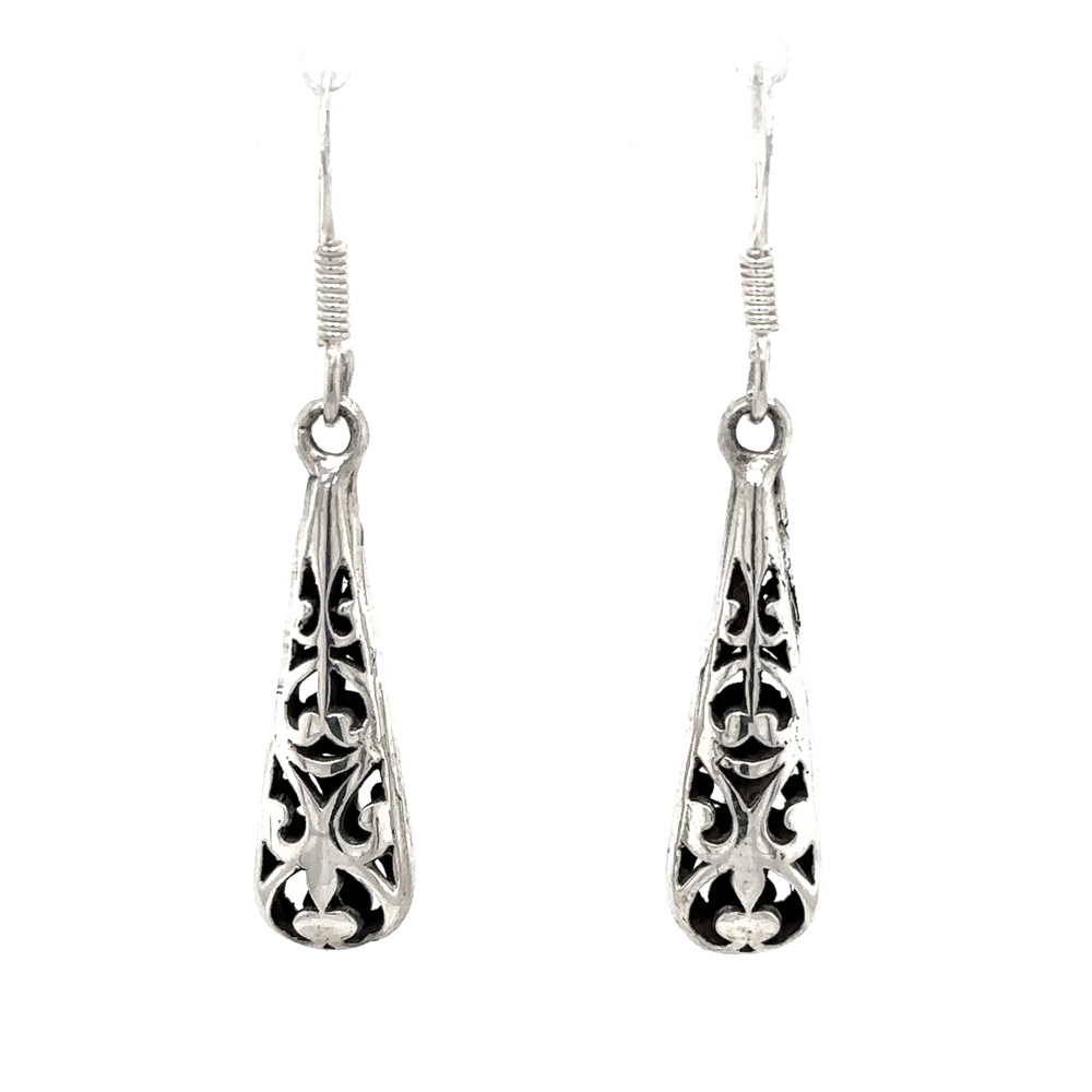 These Super Silver Bali Style Teardrop Earrings feature a filigree Bali design, adding an earthy romance to the silver accessories.