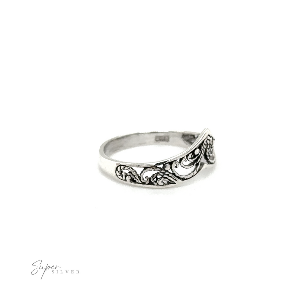 
                  
                    A Chevron ring with lacey filigree swirls.
                  
                