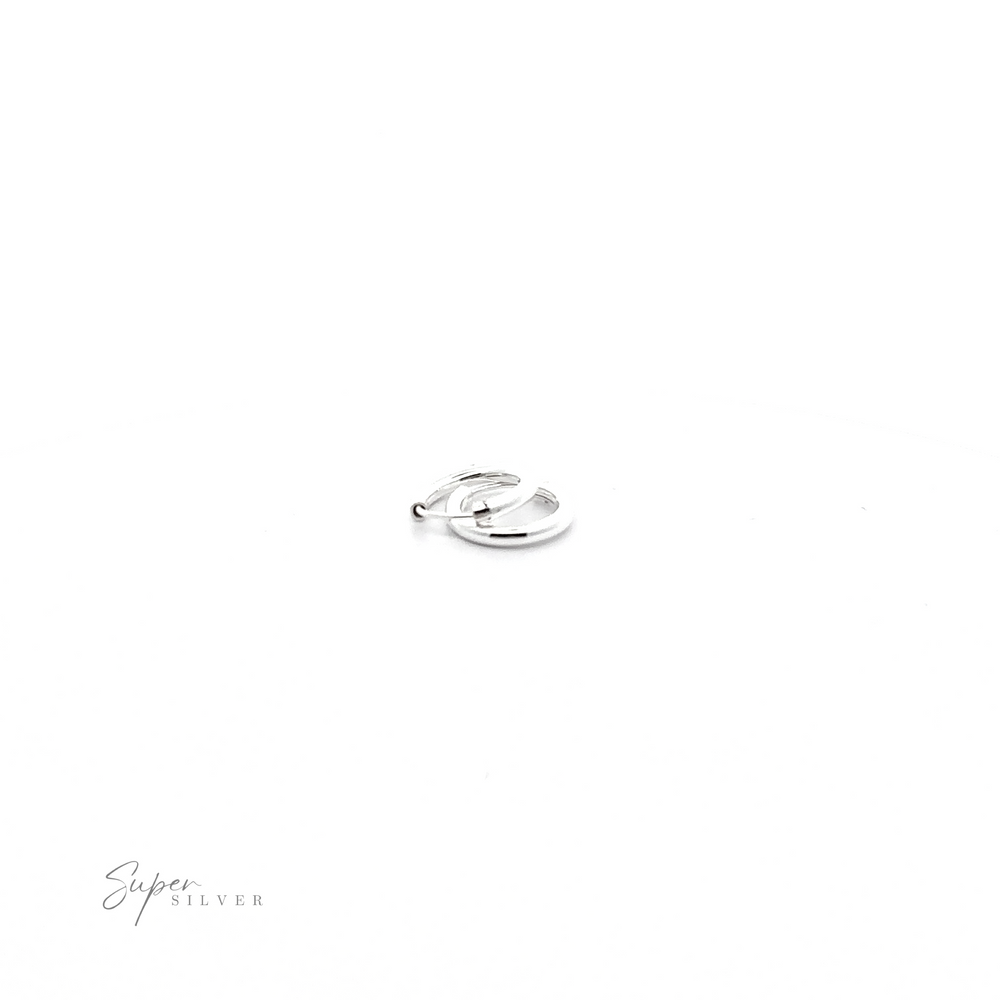 
                  
                    A minimalist 2.5mm Infinity Hoop earring on a white background.
                  
                