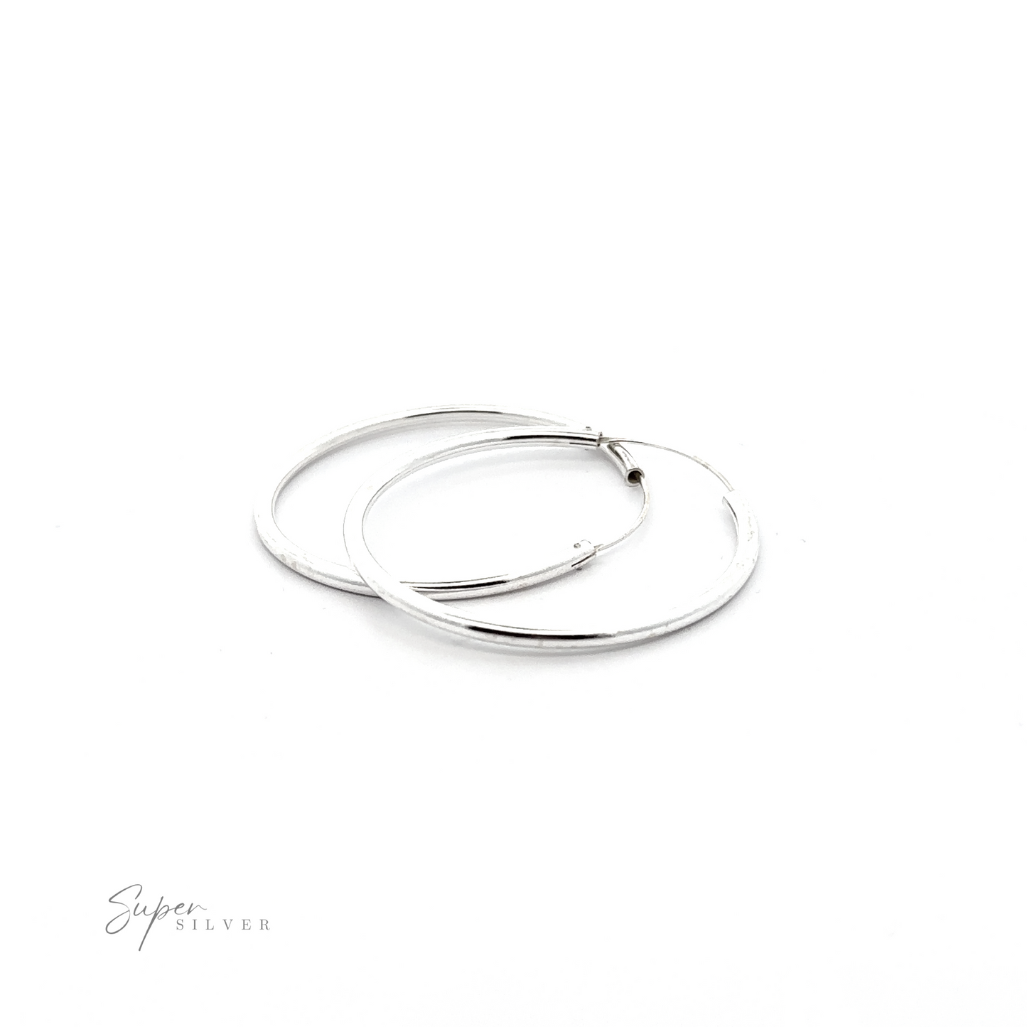 
                  
                    A versatile pair of 2.5mm Infinity Hoops on a white background.
                  
                