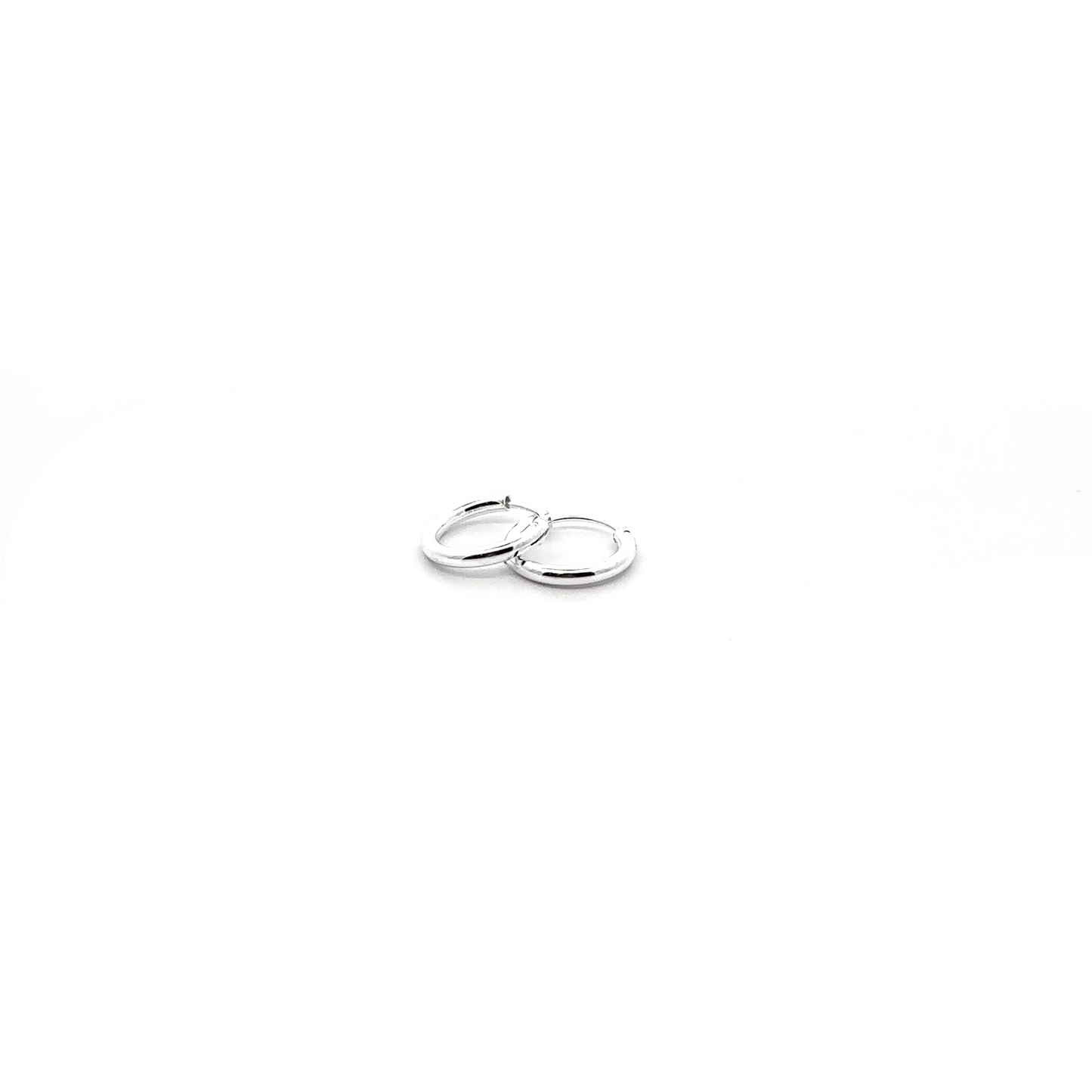 
                  
                    Versatile 2mm Infinity Hoops with a minimalist flair, displayed on a white background.
                  
                
