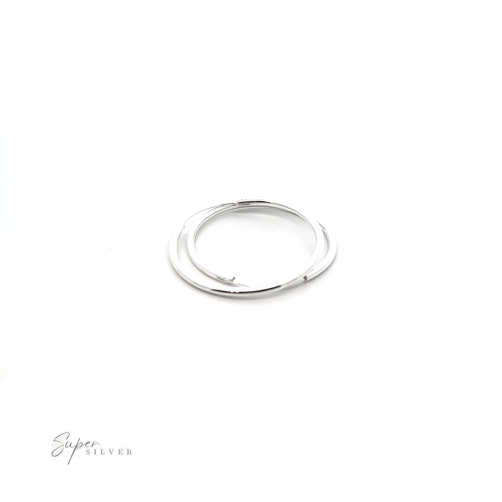 
                  
                    Versatile 2mm Infinity Hoops on a white background.
                  
                