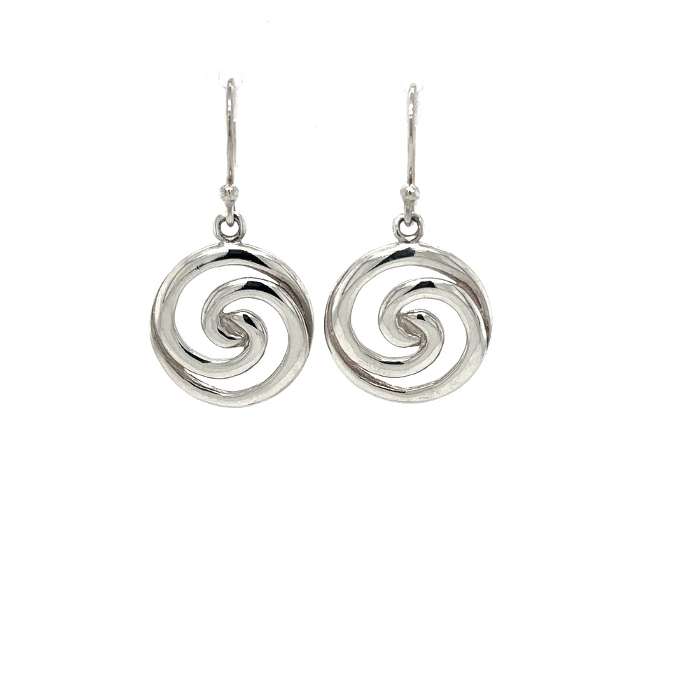 A pair of Super Silver Circular Swirl Earrings on a white background.