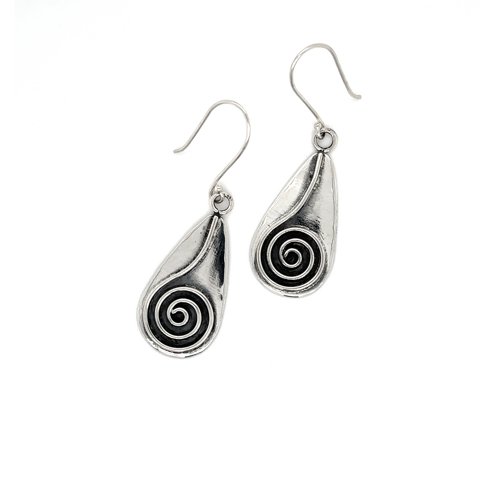 These Super Silver Statement Teardrop Spiral Earrings feature a mesmerizing spiral design, exuding cosmic energy.
