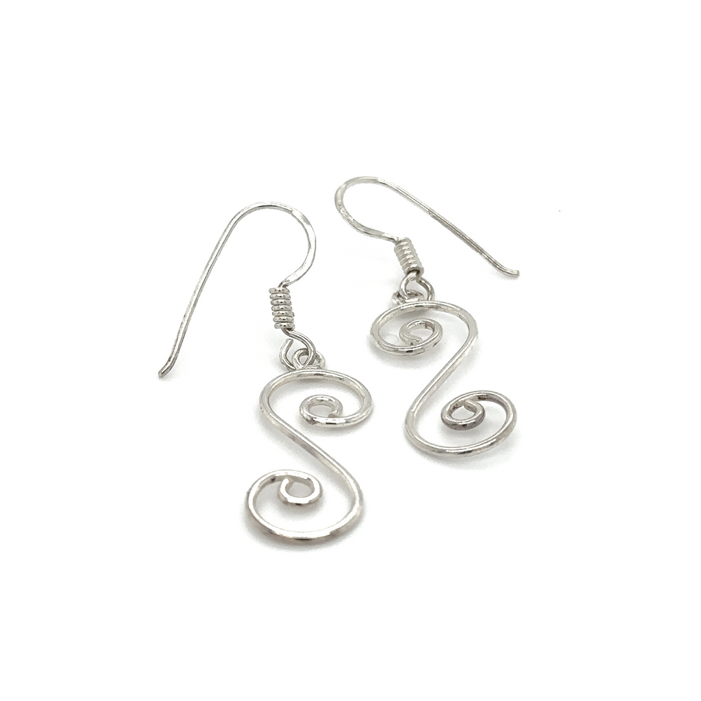 
                  
                    A pair of Super Silver Simple Swirl Earrings with a S shaped swirl design.
                  
                