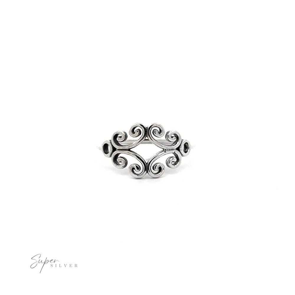 A silver Filigree Ring With Spirals. The thin band adds an elegant touch to the filigree design.