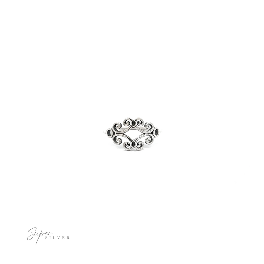 
                  
                    A sterling silver Filigree Ring With Spirals, featuring a diamond in the middle.
                  
                