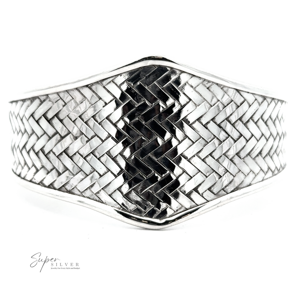 
                  
                    Close-up of a sterling silver braided bracelet with a basket weave pattern and the text "Wide Diamond Shaped Basket Weave Cuff Bracelet" in the bottom left corner.
                  
                