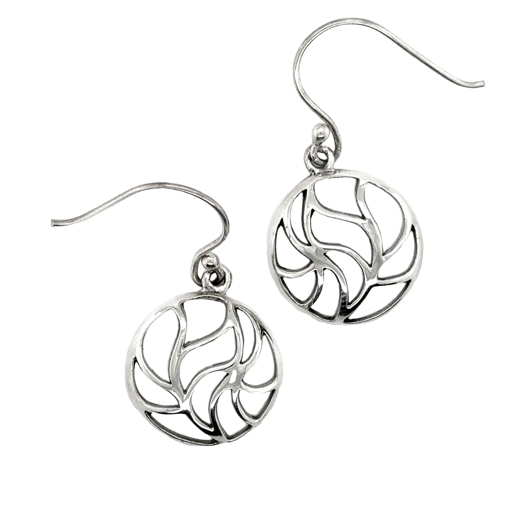 
                  
                    A pair of Super Silver Circle Earrings with Leaf Cutouts.
                  
                