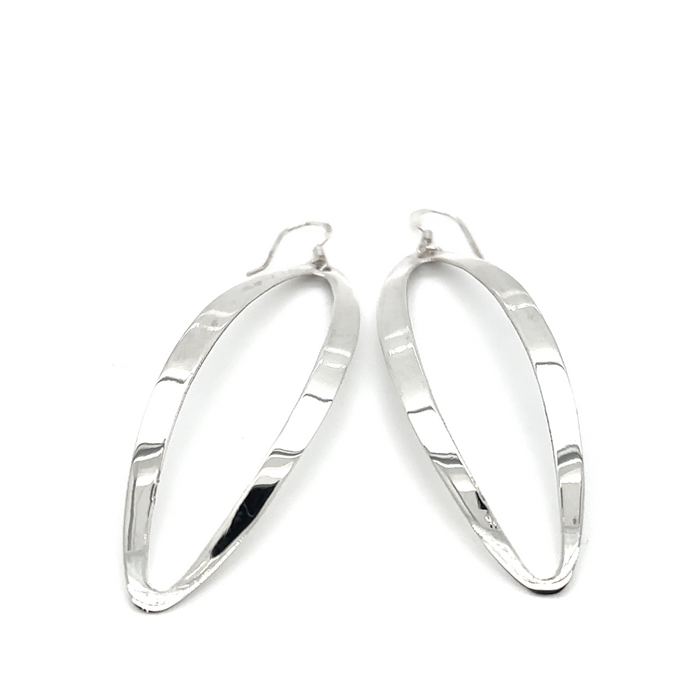 
                  
                    A pair of Large Elliptical Dangle Earrings by Super Silver on a white background.
                  
                